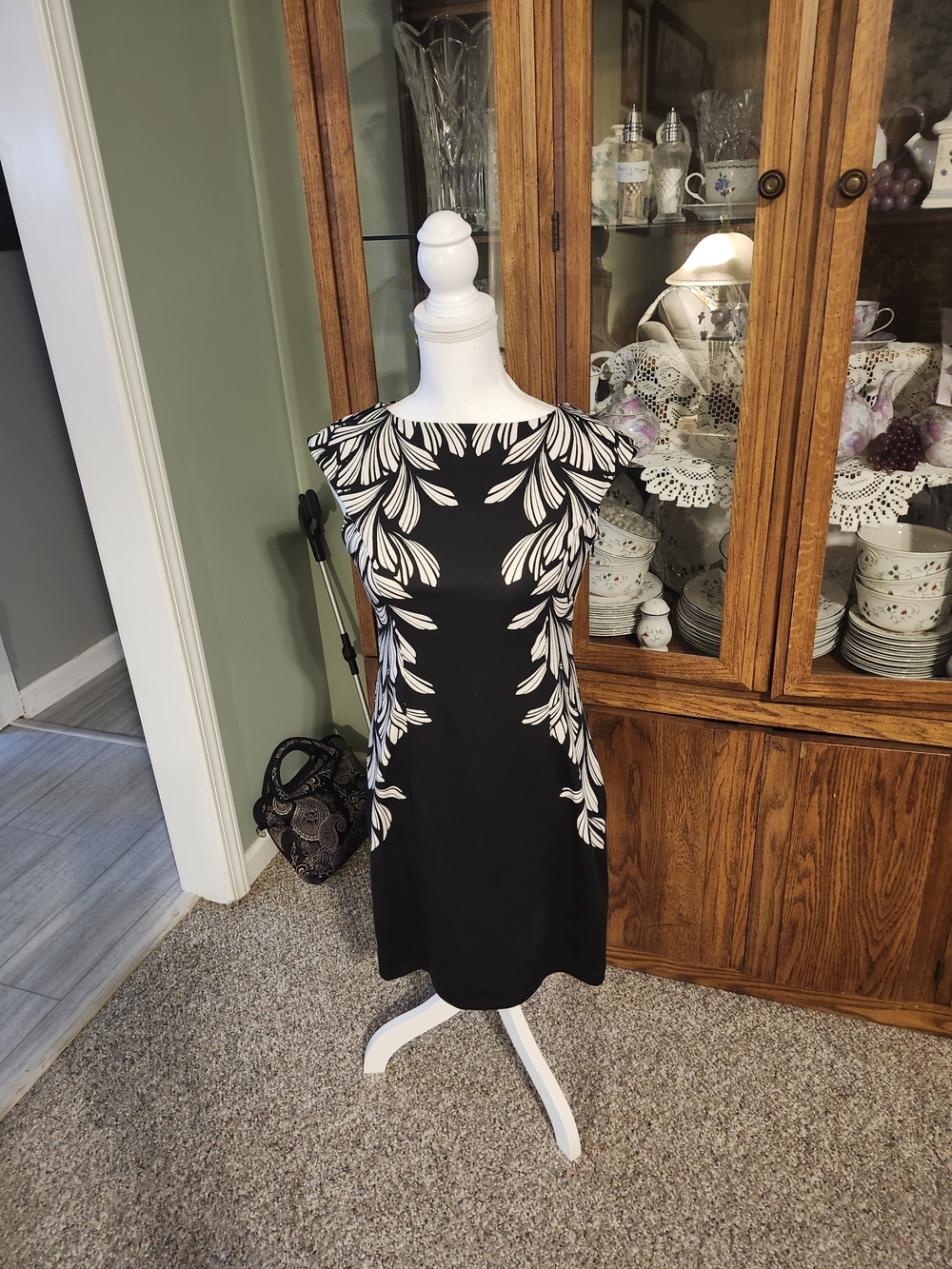 Sleeveless Black Dress with White Leaf Print